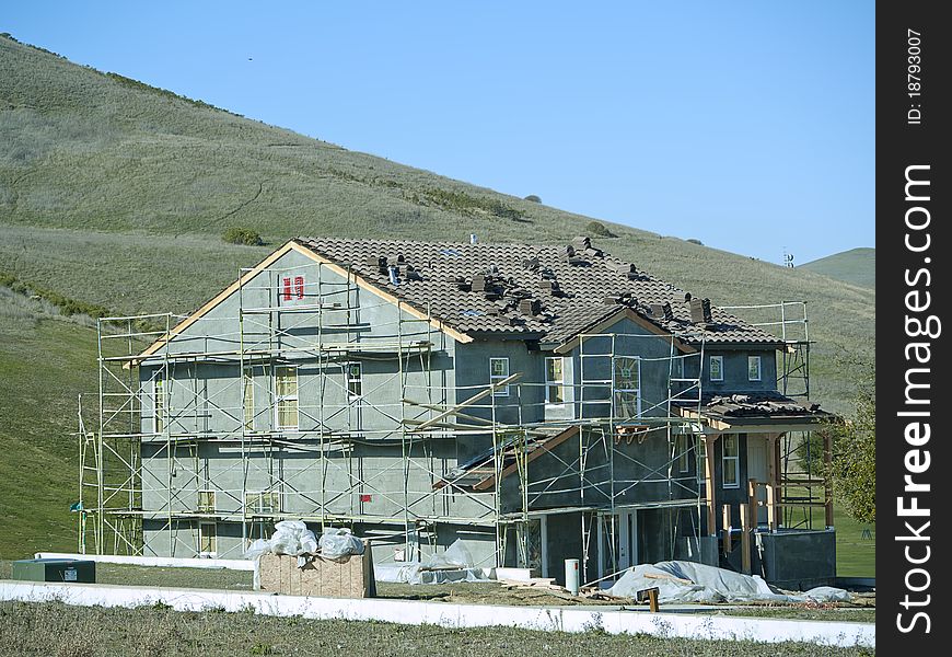 House under construction near open space