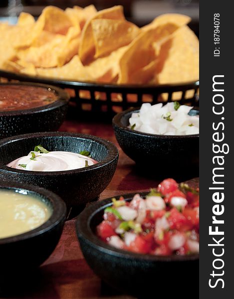 Tortilla chips with a variety of fresh salsas. Tortilla chips with a variety of fresh salsas