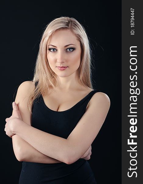 Portrait of beauty blonde girl on black background. Portrait of beauty blonde girl on black background