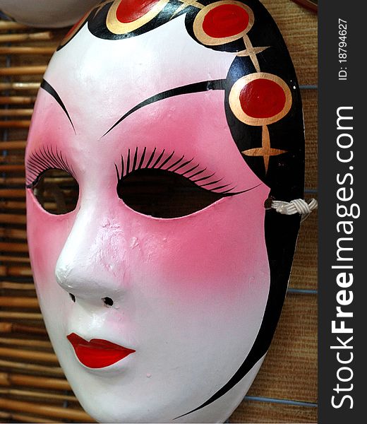 Beijing opera mask in a chinese element store.It'a a traditional art in China.