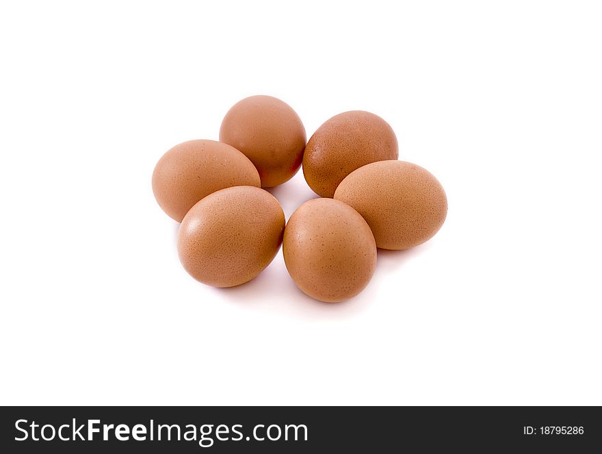 Six eggs on the white background