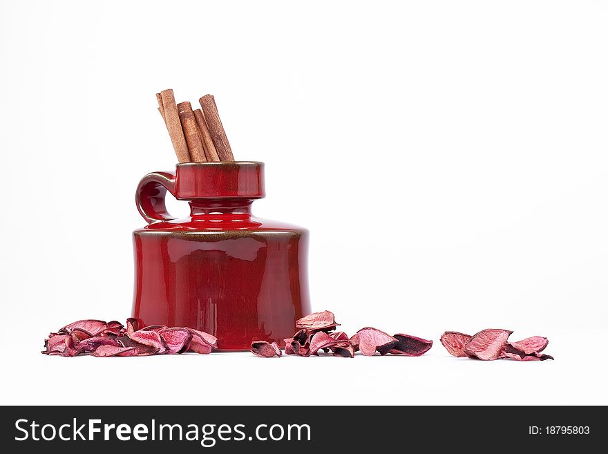 Cinnamon sticks in the vase as a decoration, side perspective. Cinnamon sticks in the vase as a decoration, side perspective