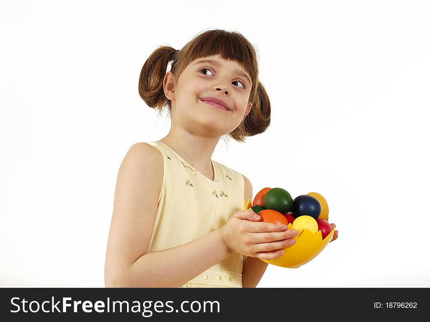 Girl keeping the basket with Easter painted eggs. Girl keeping the basket with Easter painted eggs