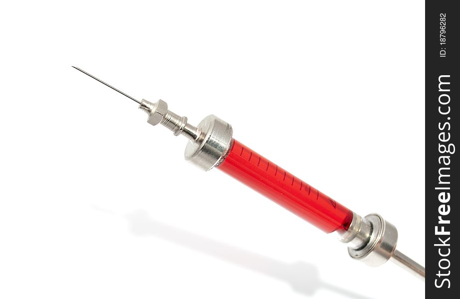 Syringe on a white background