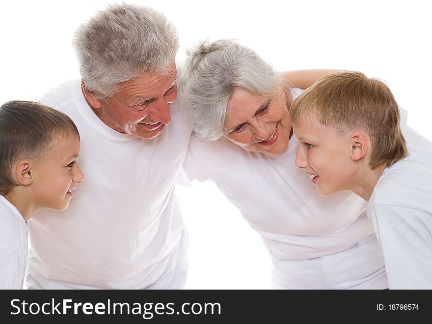 Family of four on a white background