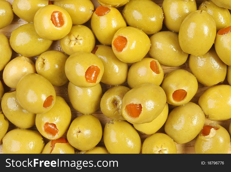 Closeup of stuffed olives as a background or texture