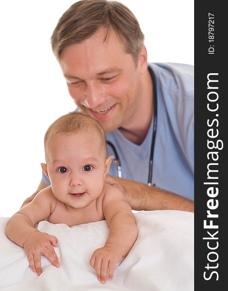 Doctor examining newborn on a white