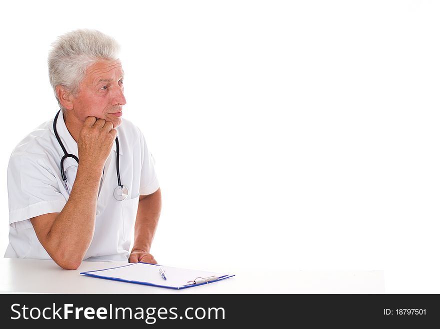 Happy doctor withs tethoscope on a white