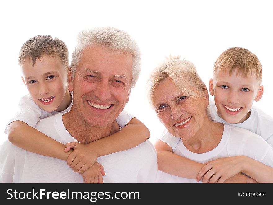 Family of four on a white background
