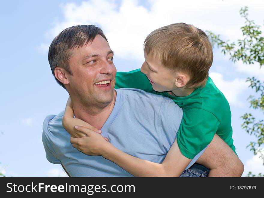 Father with his son in a park