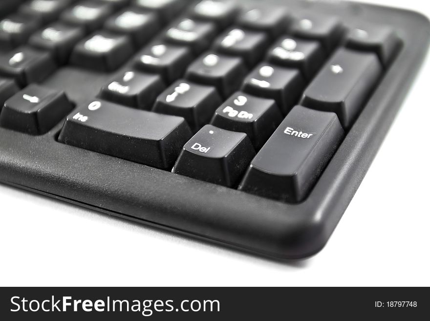 Keyboard close up with the enter button in focus ready for toning