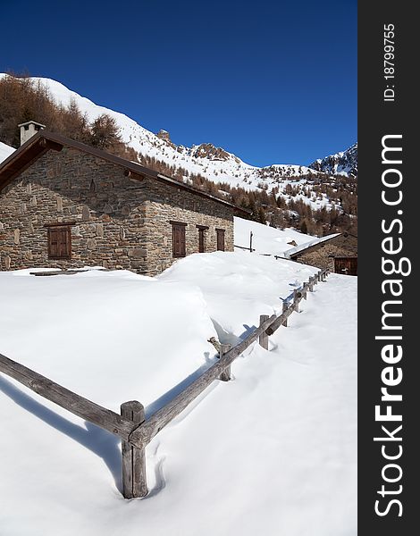 Farm in the North of Italian Alps during winter, Brixia province, Lombardy region, Italy. Farm in the North of Italian Alps during winter, Brixia province, Lombardy region, Italy