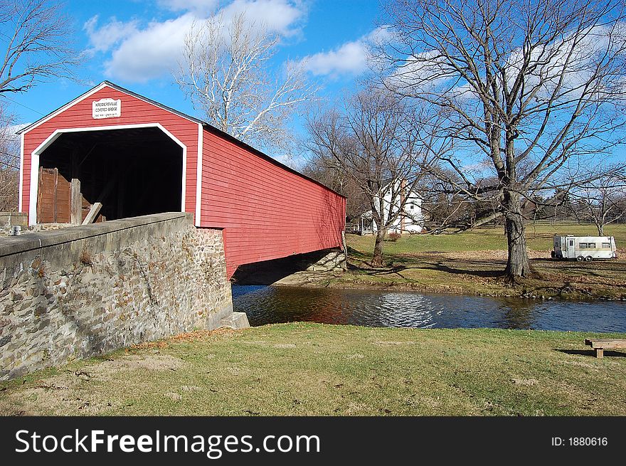 A rare covered bridge that is a historical landmark of the area