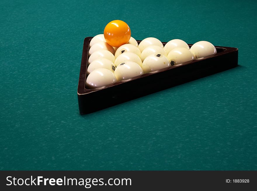 Billiard spheres in a triangle on a table