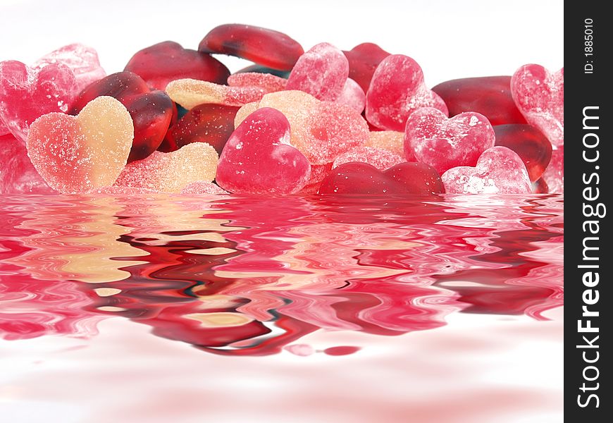 Colorful pastel candy heart soft candies with waves reflections