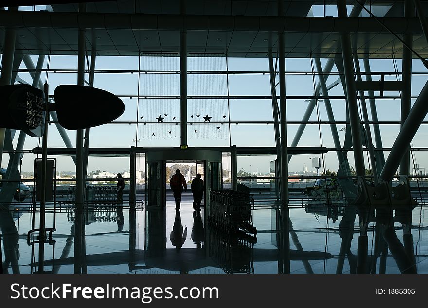 Reflex of people at the airport door. Reflex of people at the airport door