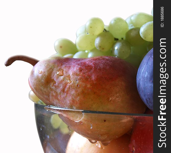 Isolated fruit-piece with the bunch of grapes, apple and fig. Isolated fruit-piece with the bunch of grapes, apple and fig
