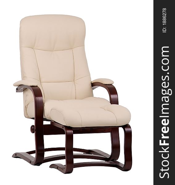 Brown and beige, leather and wood, recliner with matching footstool. Isolated on white. Brown and beige, leather and wood, recliner with matching footstool. Isolated on white.