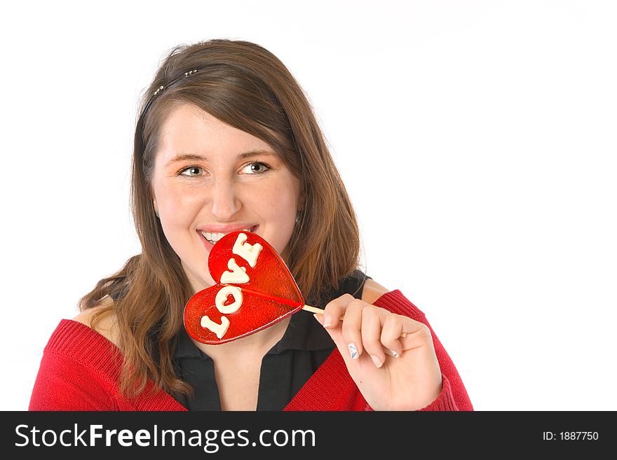 Smiling girl with red lollipop, isolated on white. Smiling girl with red lollipop, isolated on white.