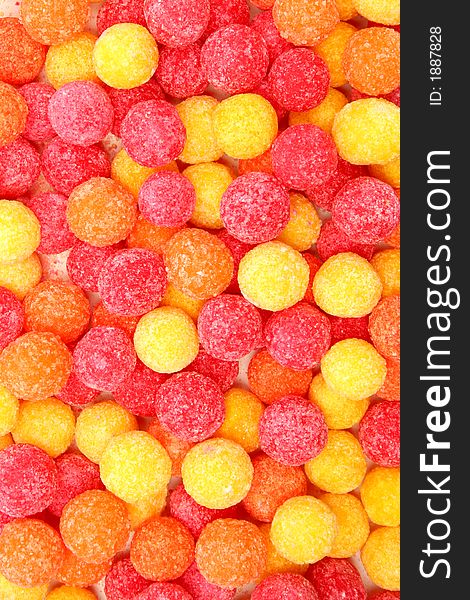 Round sugar sweets of red and yellow color