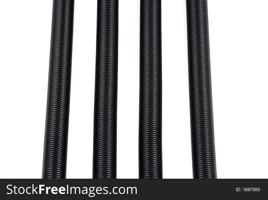 Parallel metal springs isolated over white background