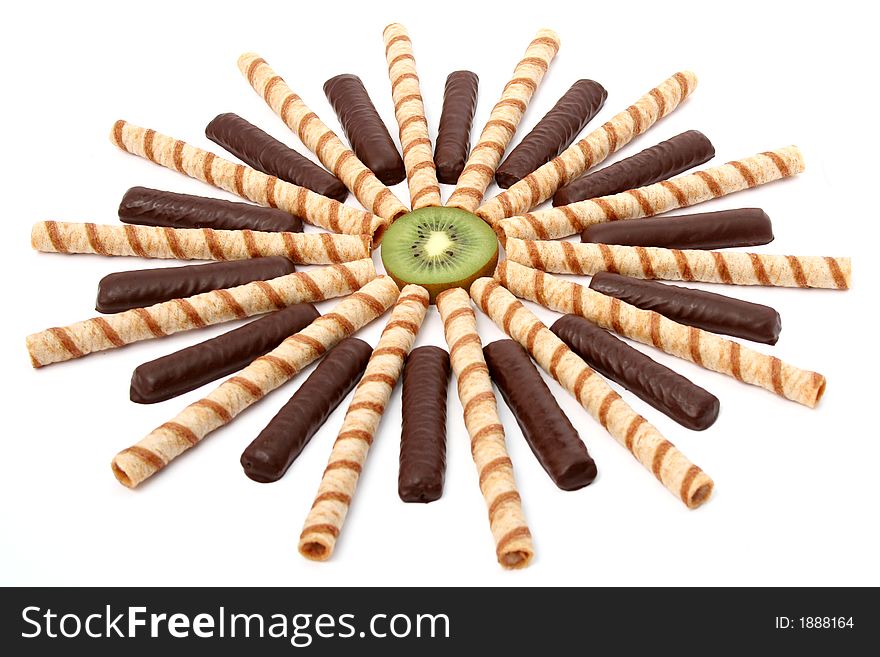 Vanilla chocolate sticks with a cream and sliced kiwi, isolated, (look similar images in my portfolio)