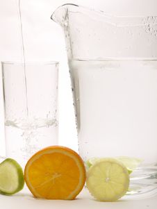 Lemon, Lime And Orange With A Jug And A Glass Royalty Free Stock Photo Lemon, Lime And Orange With A Jug And A Glass Royalty Free Stock Photo