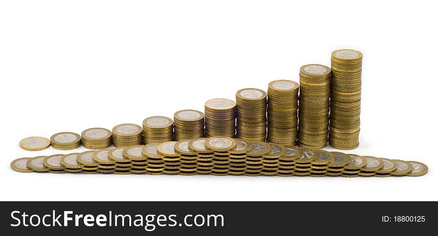 Columns from coins on a white background