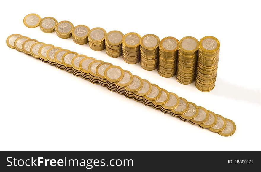 Columns from coins on a white background