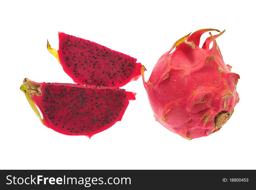 Red Dragon Fruit With Two Slices Showing The Small Black Seeds