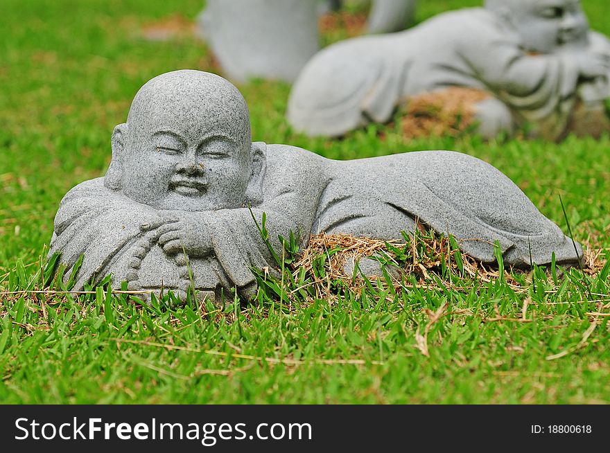 Young Buddha Statue In A Lying Pose