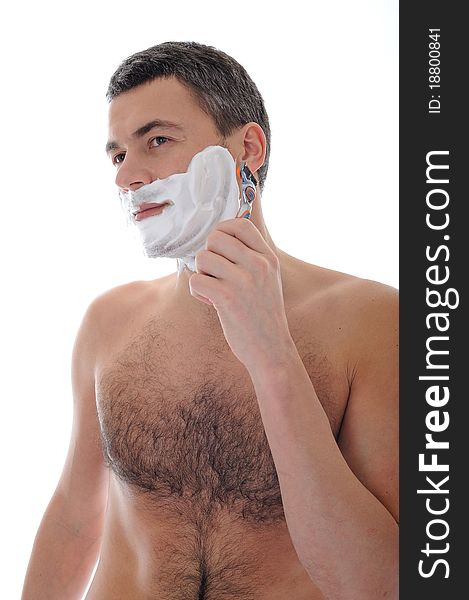 Young handsome male shaving face beard . isolated on white background