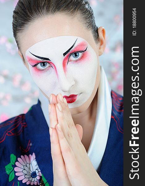 Japan geisha woman with creative make-up.close-up artistic portrait