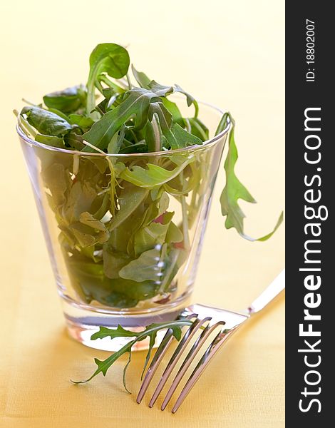 Salad in a glass with fork