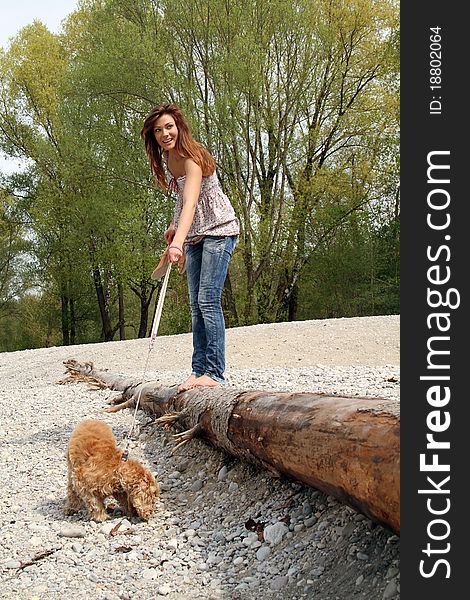 Girl relaxing in the park with dog. Girl relaxing in the park with dog