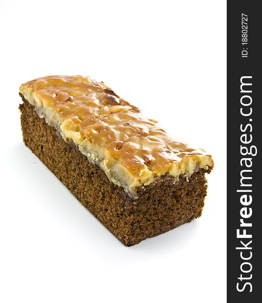 Row of toffee cake isolated on white background