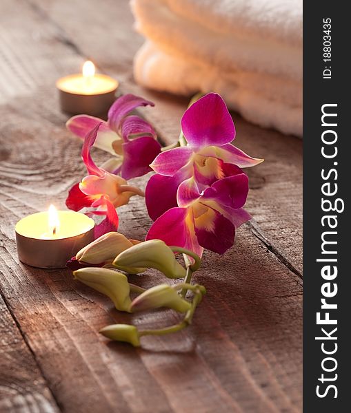 Spa concept with candles and orchid