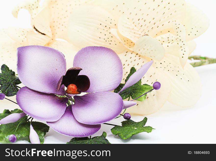 Multicolored flower decoration isolated on white background