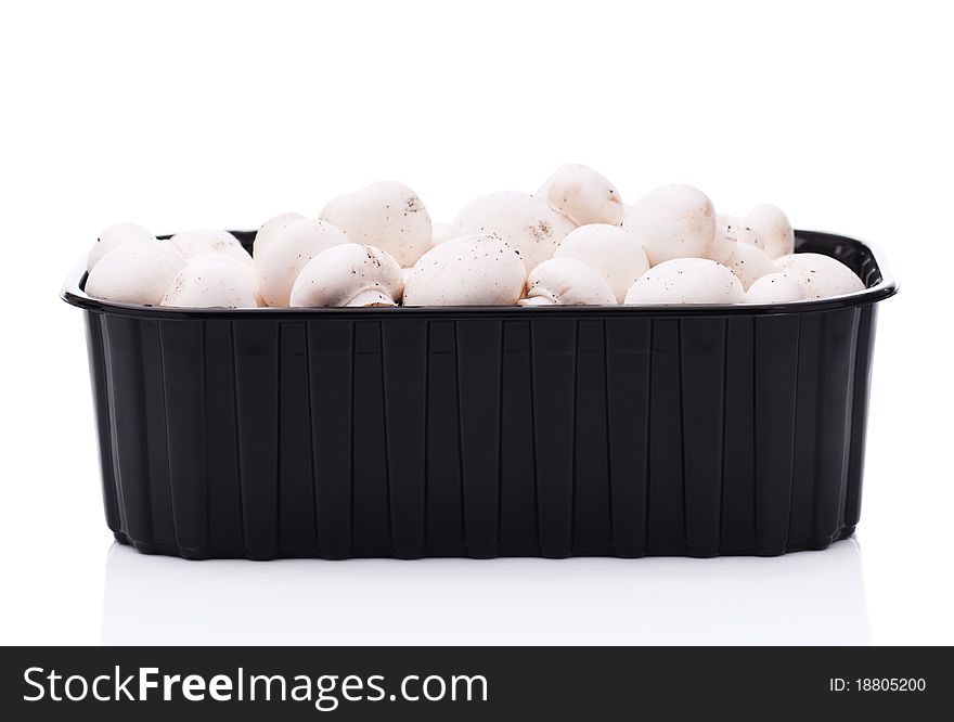 Fresh mushrooms champignons isolated on white background