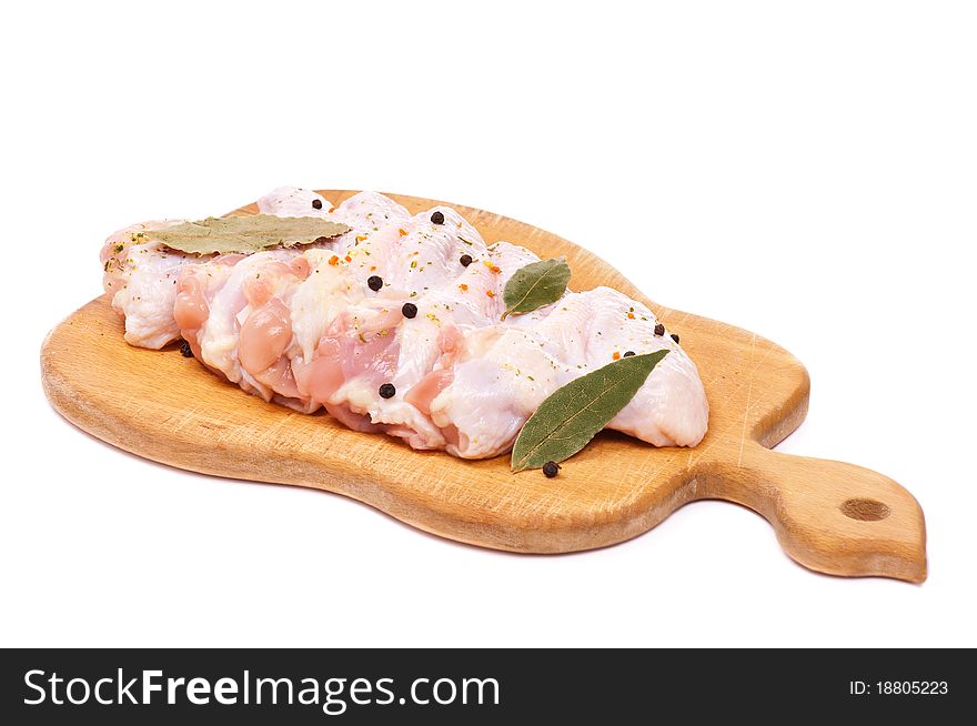 Fresh raw chicken wings isolated on a white background