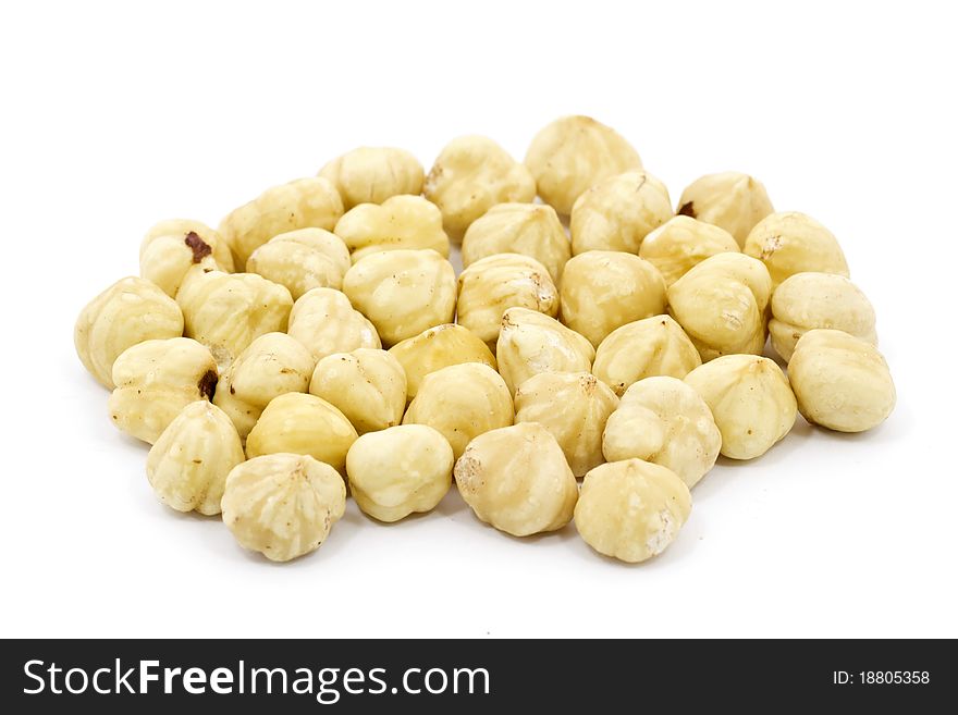 Hazelnuts closeup view on white background. Hazelnuts closeup view on white background