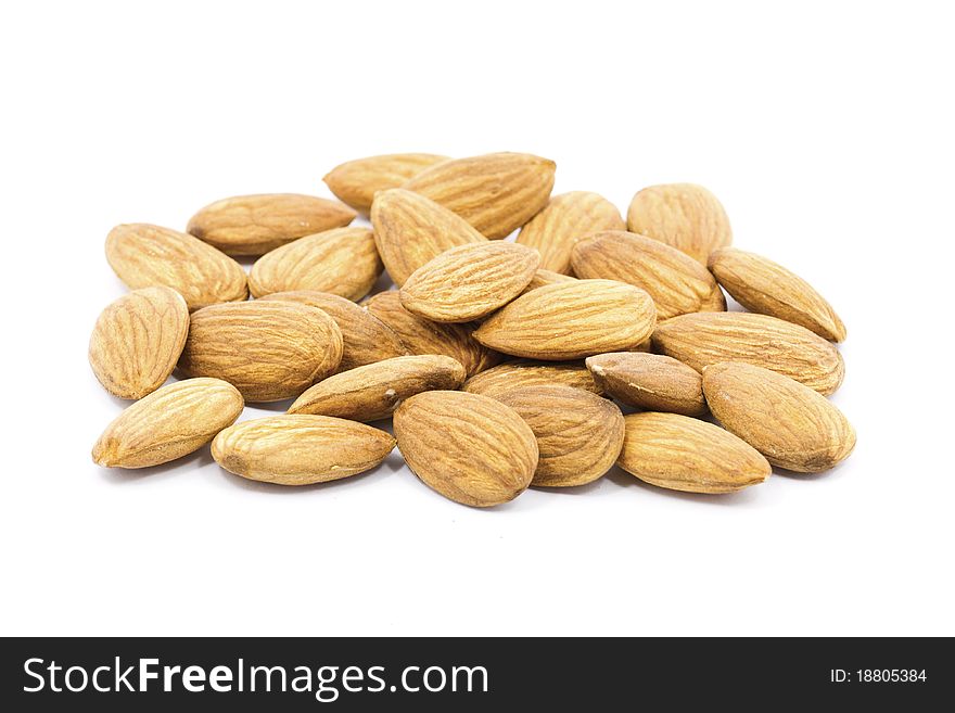 Group of almonds isolated on white background