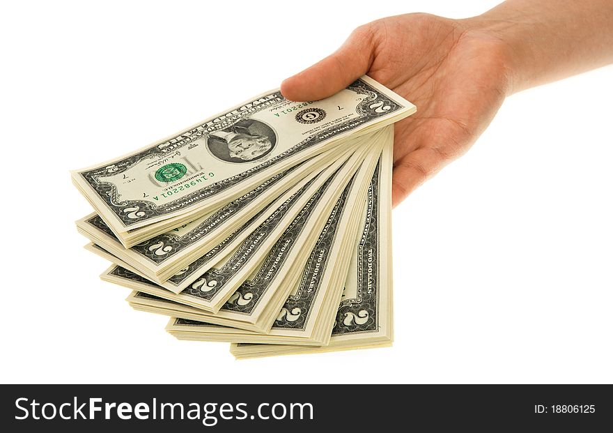 A womans hand demonstrating a pile of two-dollar banknotes. A womans hand demonstrating a pile of two-dollar banknotes
