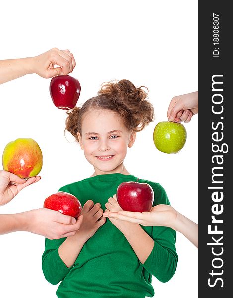 Smiling girl choose among proposed apples