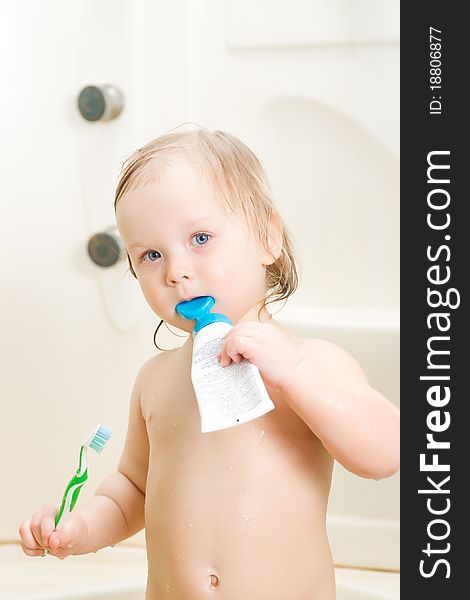 Adorable Baby Brushing Teeth In Shower