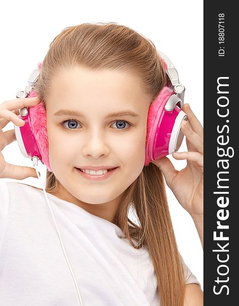Young attractive girl with blue eyes in headphones