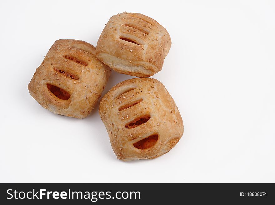 Baked puff pastry on a white background