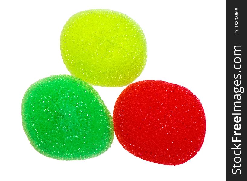 Multicolored sponges for washing dishes, isolated on a white background.