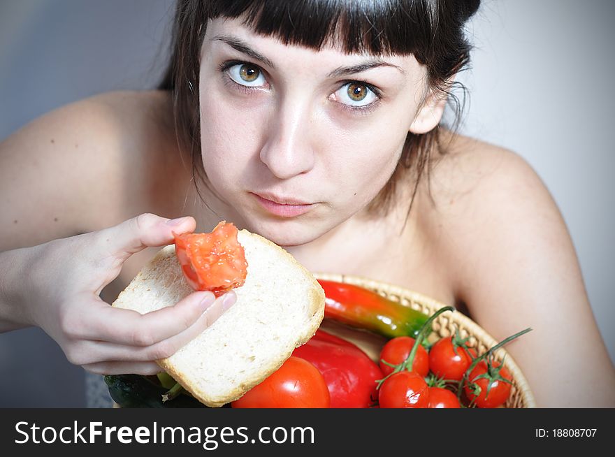 Vegetarian Girl Eating Tomato