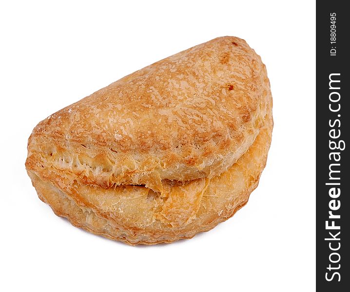 Baked puff pastry on a white background